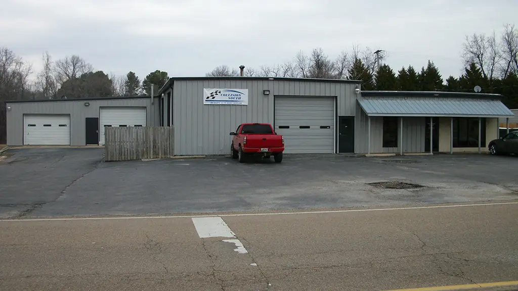 The Collision South building on Edwards Drive in Jackson, Tennessee, with signage above the bay doors